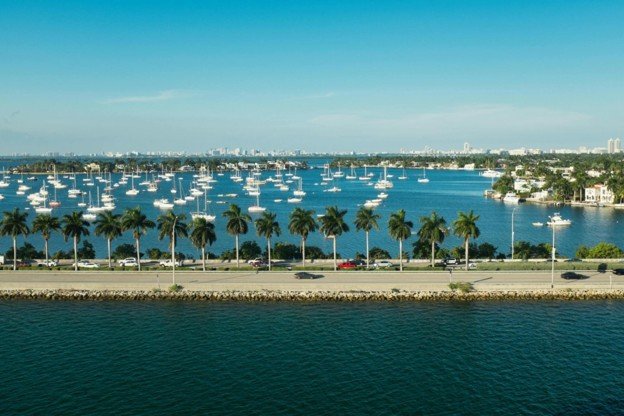 MacArthur Causeway leading to PortMiami with Biscayne Bay and Miami skyline in the distance