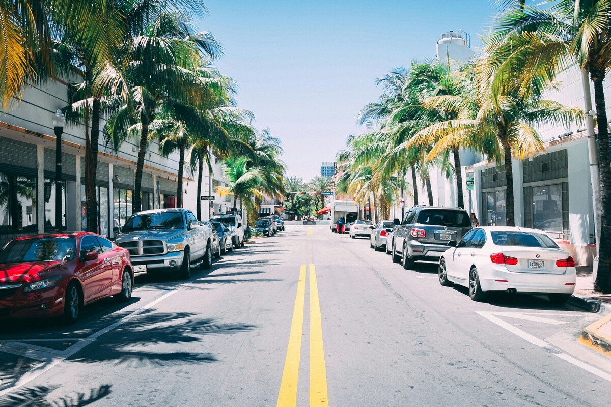 Cars on a South Beach street in Miami Beach, an area covered by corporate car service in Miami